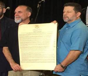 B'ney Yosef North America Articles of Declaration presented by Elder Barry Phillips (r) and Executive Director Albert McCarn (l) upon affirmation on March 5, 2016.